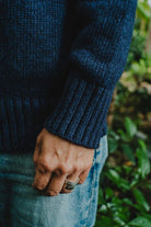 Detail of the ribbed knit cuff of the blue Lobo Blue Fisherman sweater, made in Portugal.