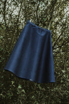 Rear view of the Inês denim skirt by Lobo Apparel showing the elasticated waistband for comfort.