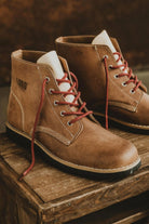 Lobo Raw Boots in brown leather with red laces, Goodyear Welt construction, handcrafted in Portugal.