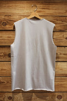 "Back view of the unisex Lobo grey tank t-shirt, highlighting the minimalist cut, premium cotton, and raw-edge hem finish.