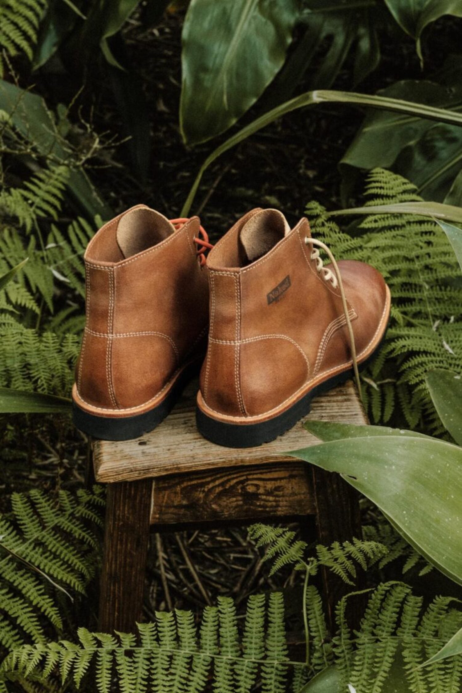 Rear view of Lobo Apparel Raw Boots highlighting the premium leather construction and handcrafted finish.